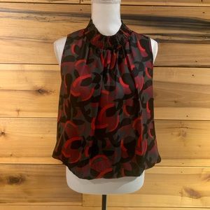 Sleeveless geometric print slimming top size L ver versatile